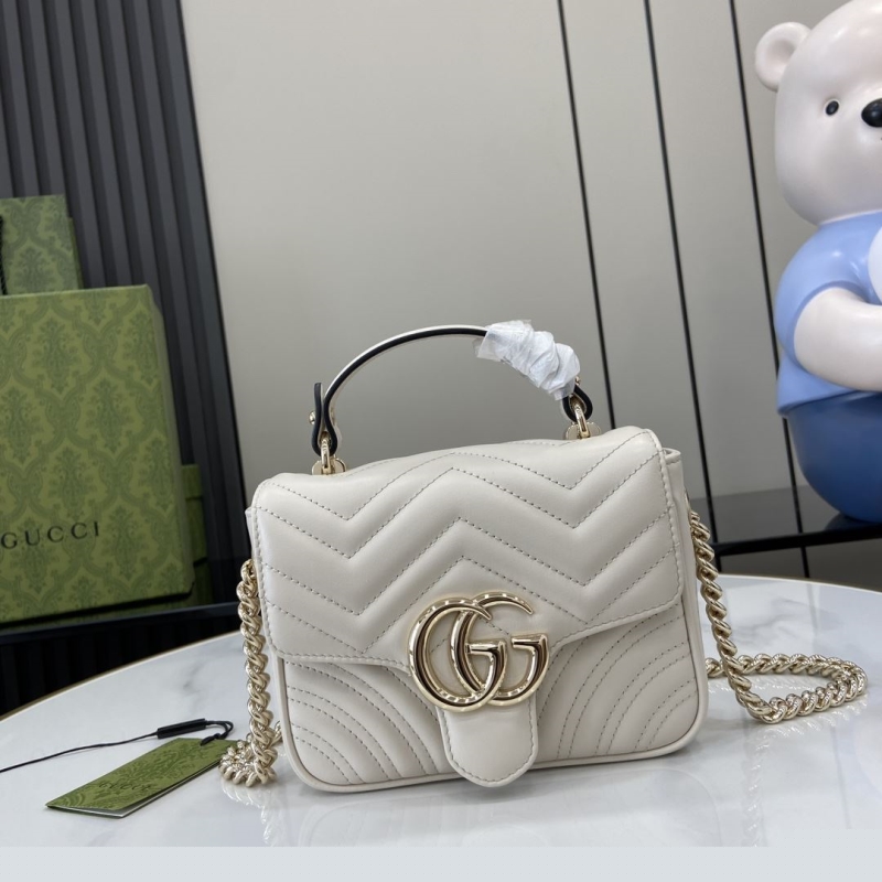 G*u*i top handle bags